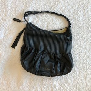 Black leather Cole Haan purse.